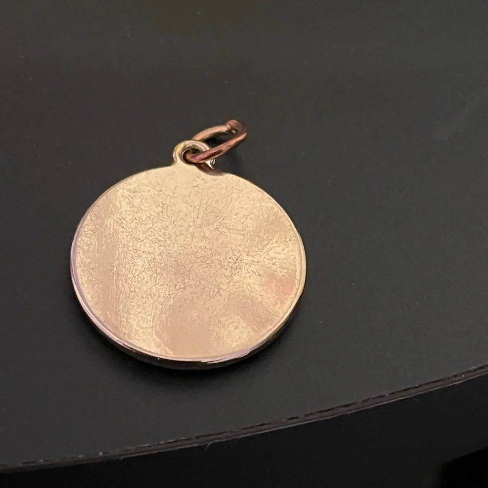 Louis Vuitton zipper pull/charm. Coral color 1” long